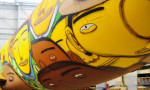 Os Gêmeos grafitean el avión oficial de la selección brasileña de fútbol 10